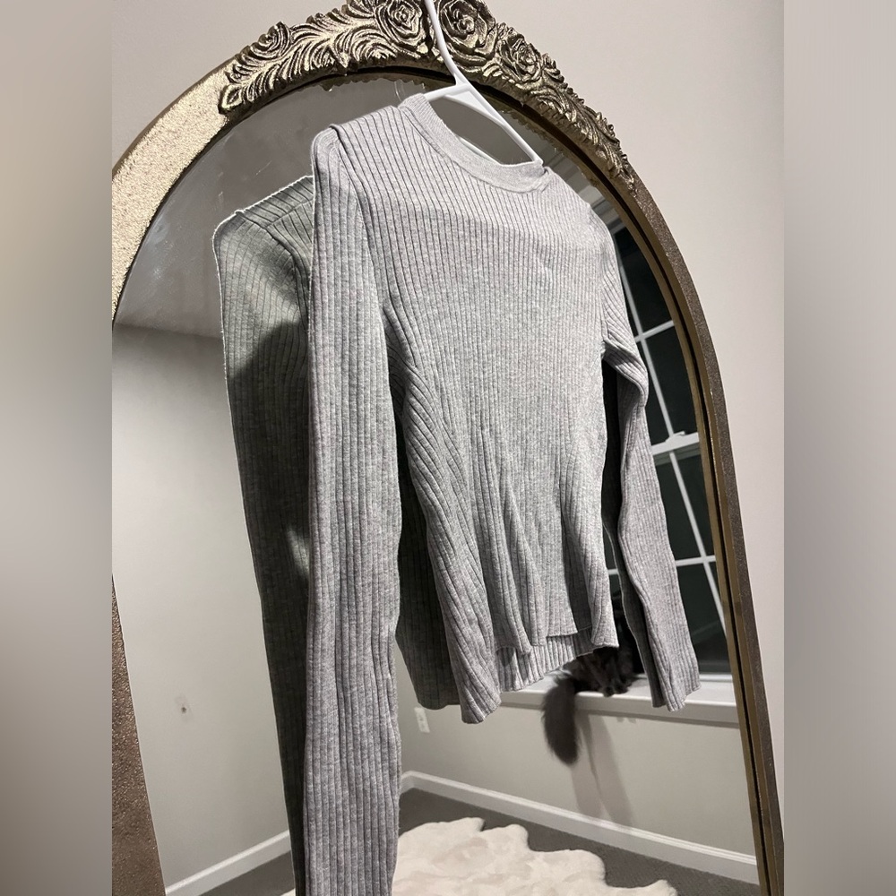 Divided, small, grey sweater